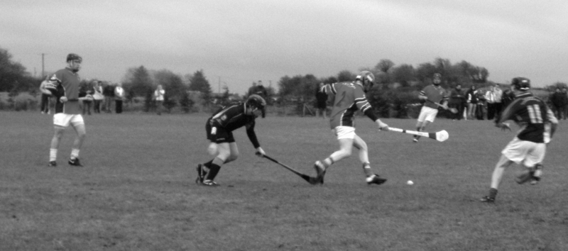 One of the Castlebar IT corner backs endeavours to clear his lines as Letterfrack’s Patrick Naughton moves in to put him under pressure during the 2008 Division 3 League Final.